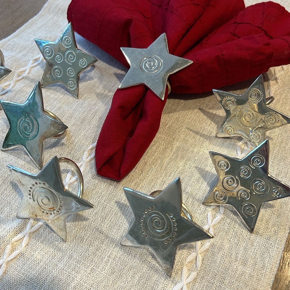Silver plated star napkin rings. Set of 8.